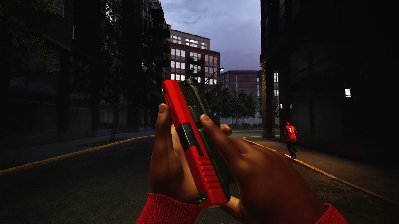 First-person view of a red pistol on a city street